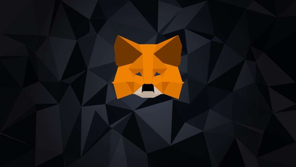 The image features the logo of MetaMask, a popular cryptocurrency wallet. The logo is designed as a stylized, geometric fox head in shades of orange and white, set against a dark, polygonal background