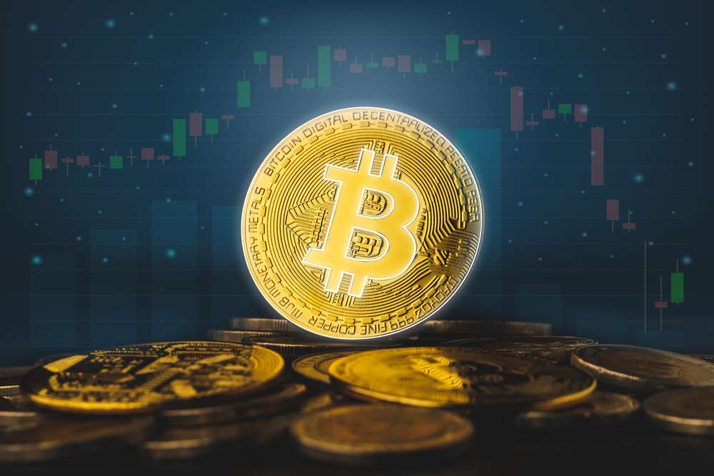 Bitcoin Reclaims $98K as Fed Pauses Rate Hikes Amid Economic Concerns